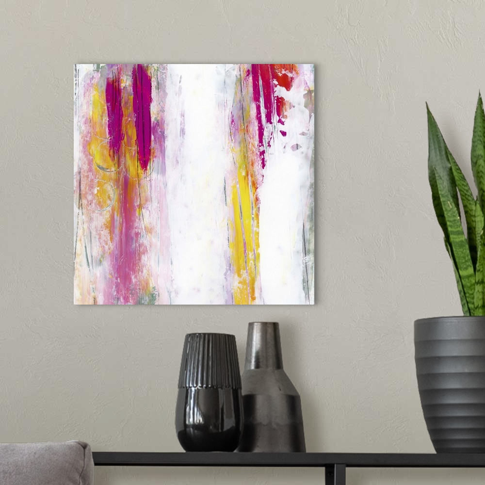 A modern room featuring Contemporary abstract painting using vertical fading streaks of pink, purple and yellow.