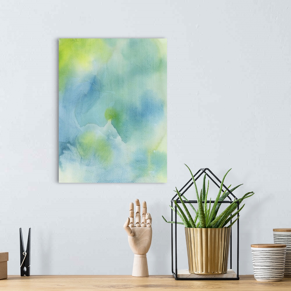 A bohemian room featuring Contemporary abstract painting using soft blue and green tones in watercolors.