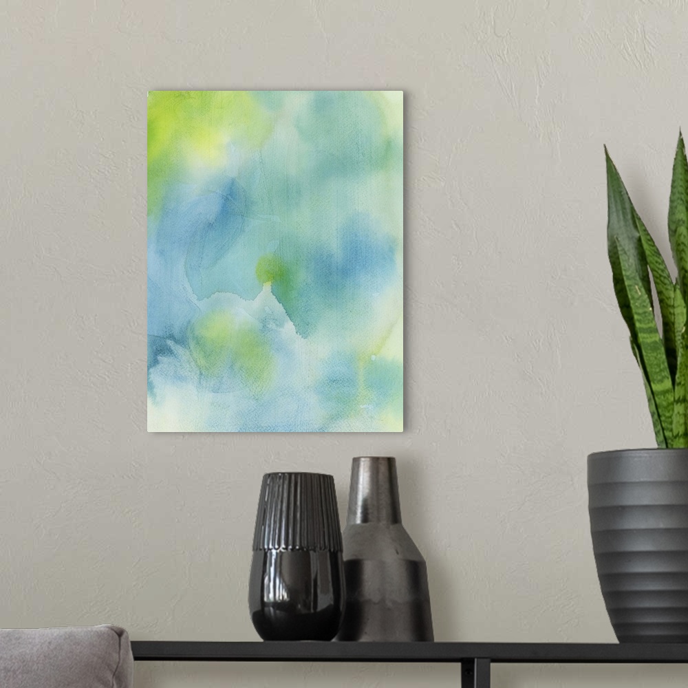 A modern room featuring Contemporary abstract painting using soft blue and green tones in watercolors.