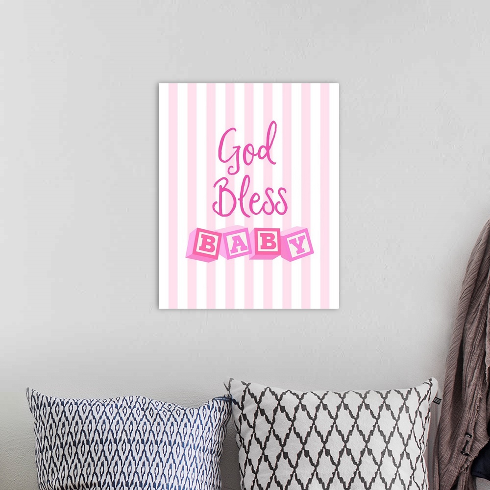 A bohemian room featuring Pink nursery art reading "God bless baby" with letter blocks on stripes.