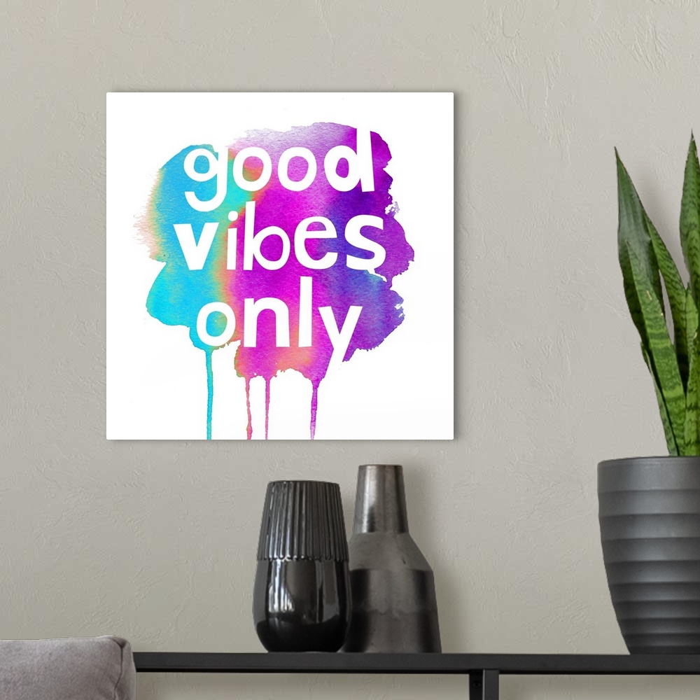A modern room featuring Good Vibes Only
