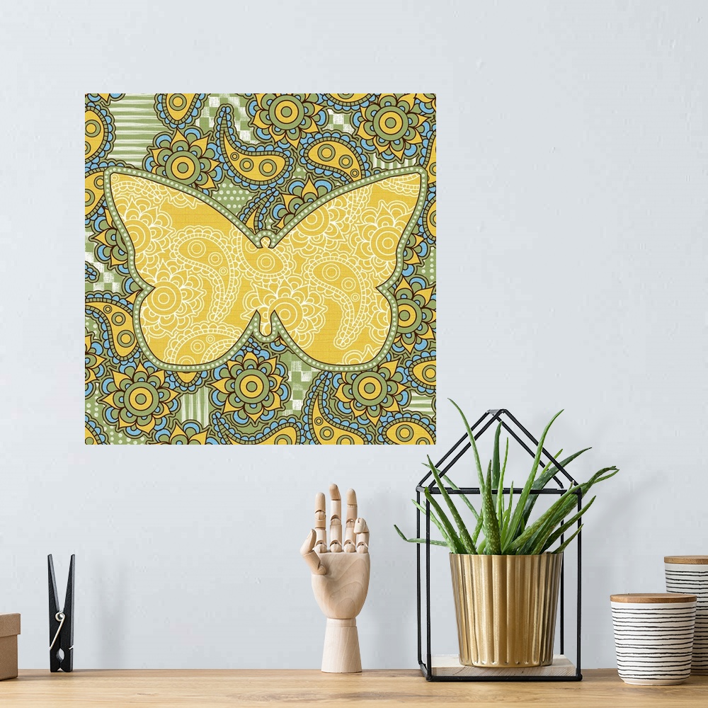 A bohemian room featuring Colorful paisley patterned artwork with the silhouette of a butterfly.
