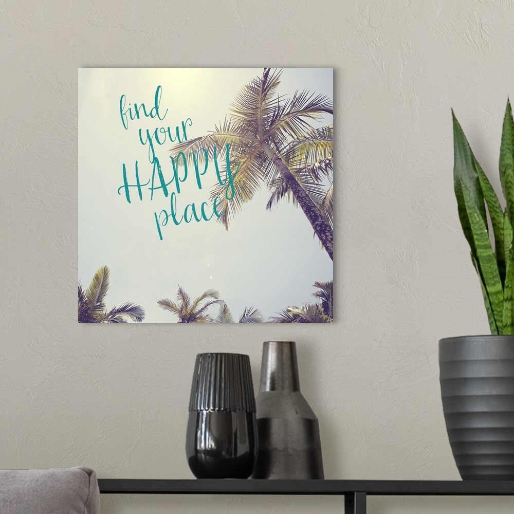A modern room featuring The words "Find your happy place" in teal script over a vintage-style photograph of palm tree lea...