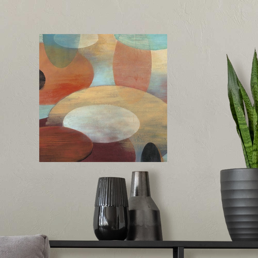 A modern room featuring Contemporary abstract painting of organic shapes in pale colors hovering around each other over a...