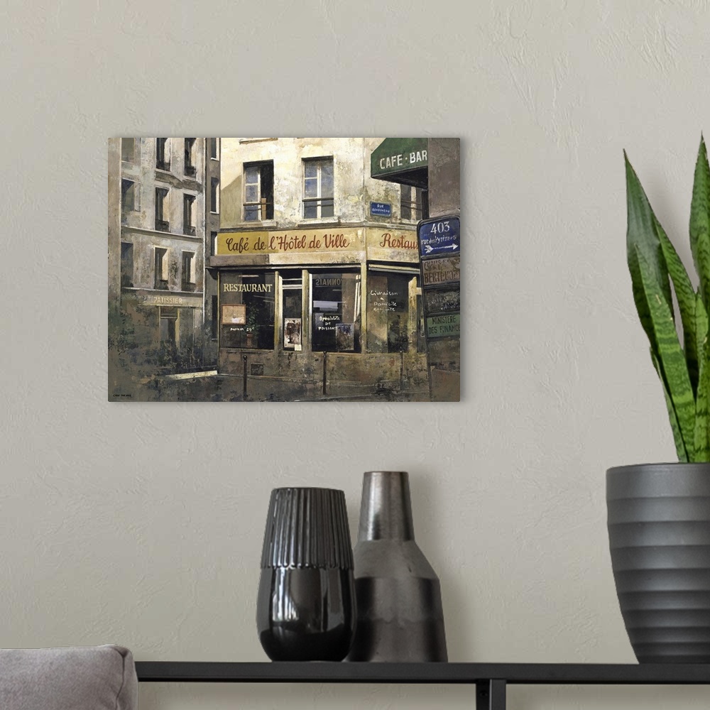 A modern room featuring Contemporary painting of a hotel storefront downtown in a city.