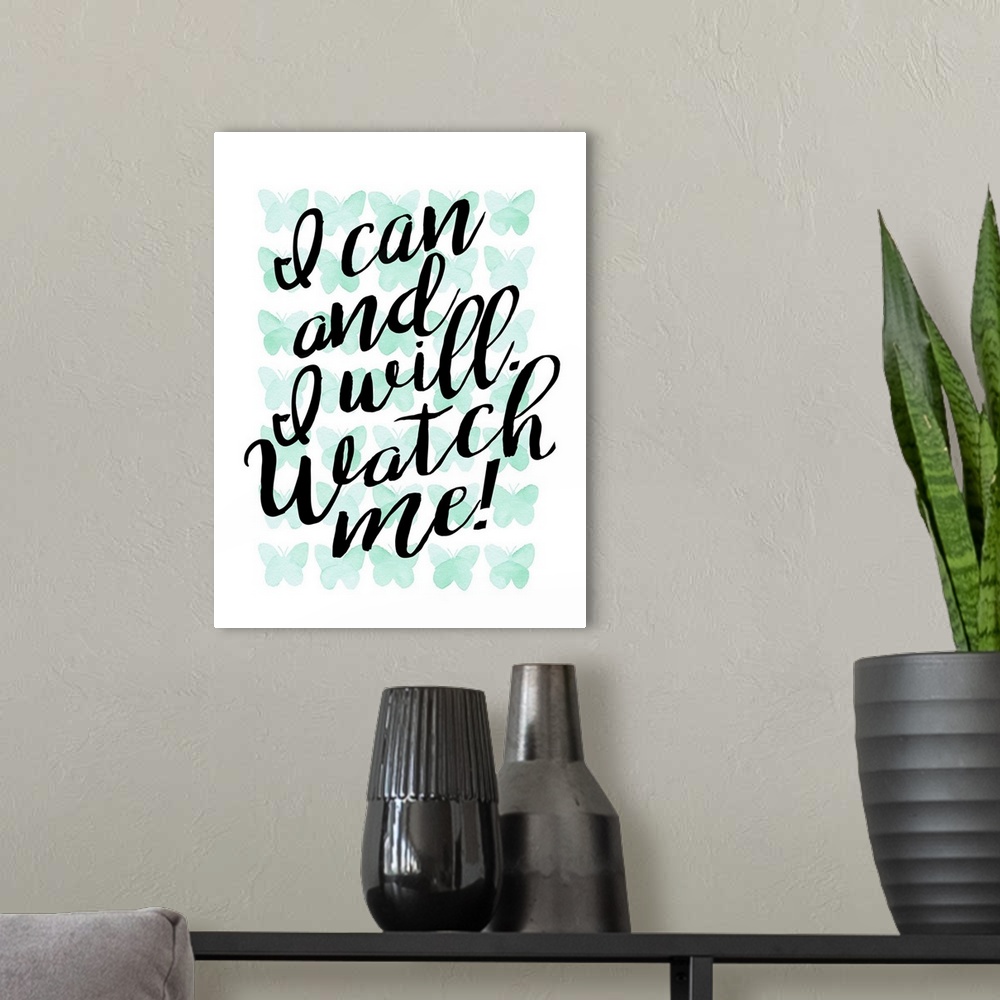 A modern room featuring Handlettered inspirational sentiment over turquoise butterflies.