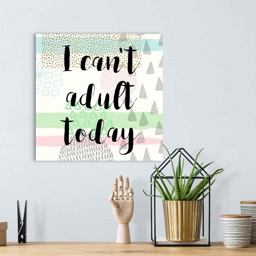 A bohemian room featuring Black handlettered text on a boho background of dots, stripes, and triangular shapes.