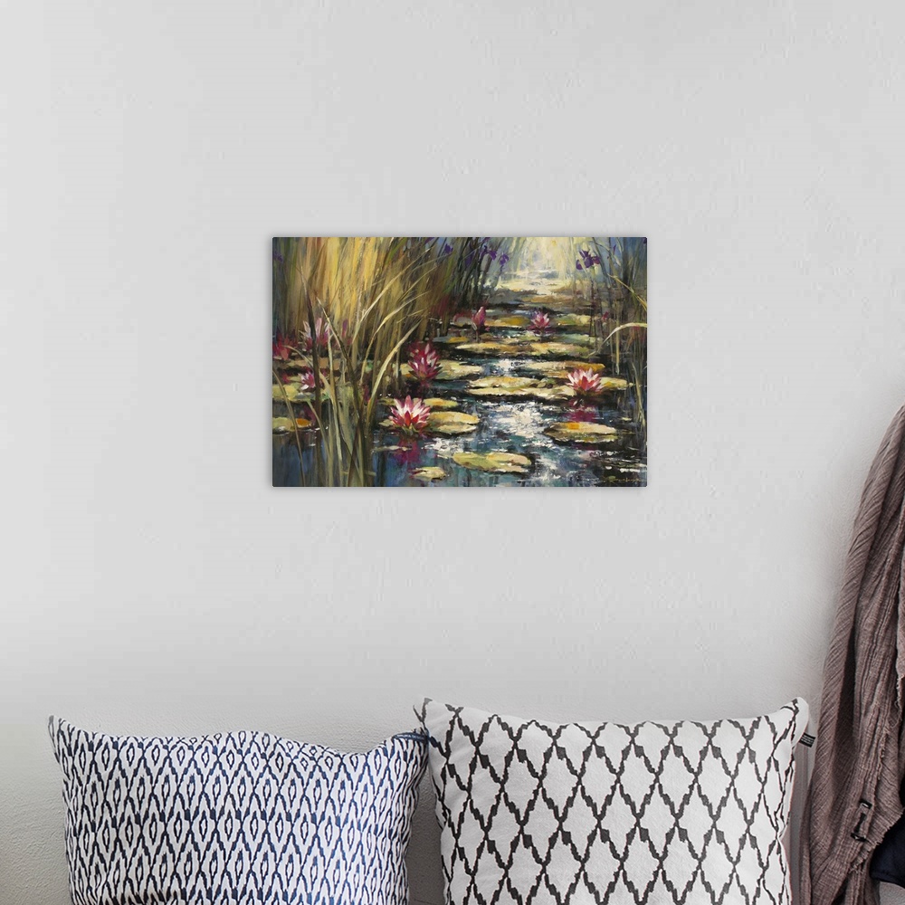 A bohemian room featuring Contemporary painting of pond with colorful waterlilies sitting on top of lily pads.