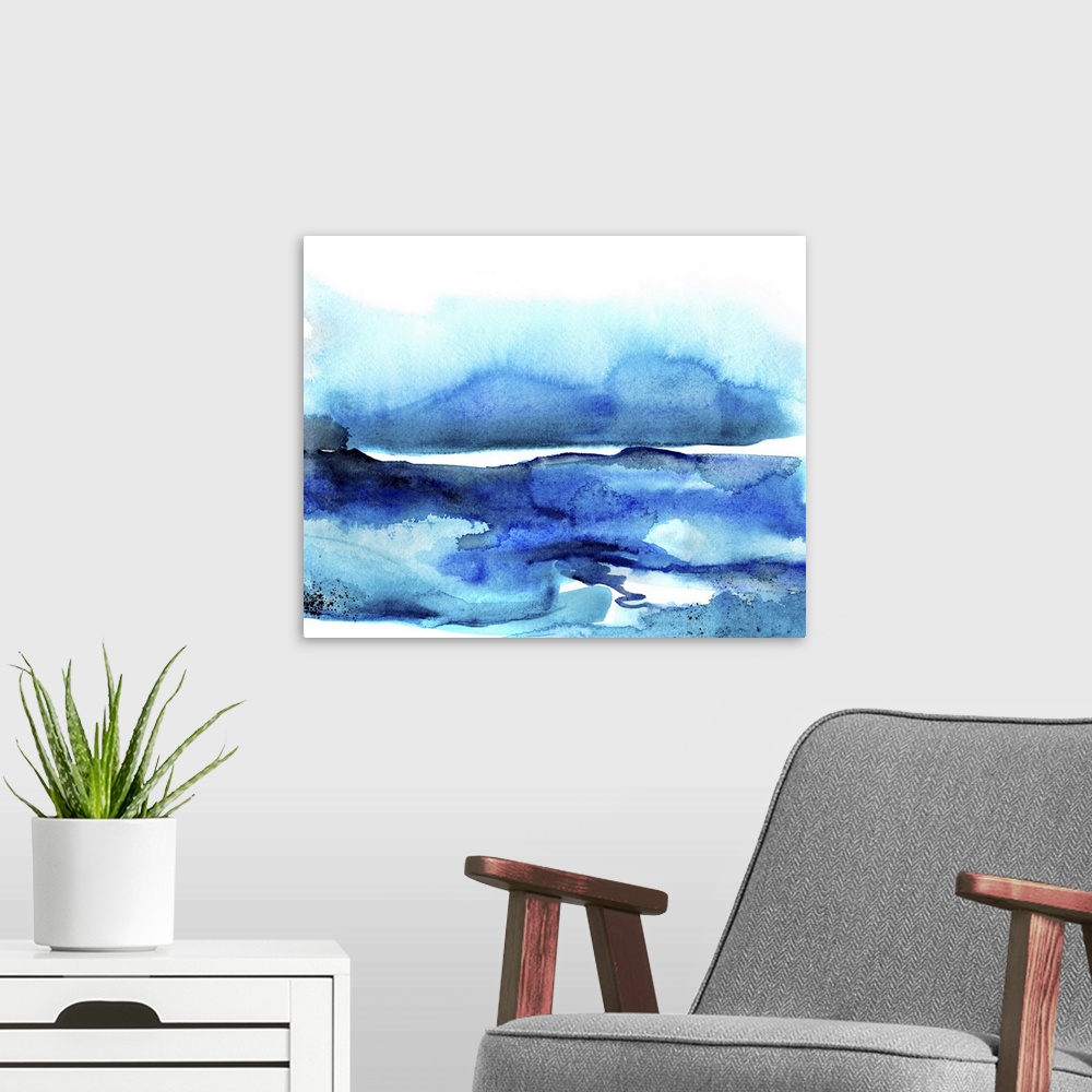 A modern room featuring Abstract watercolor artwork of shades of blue blending together.