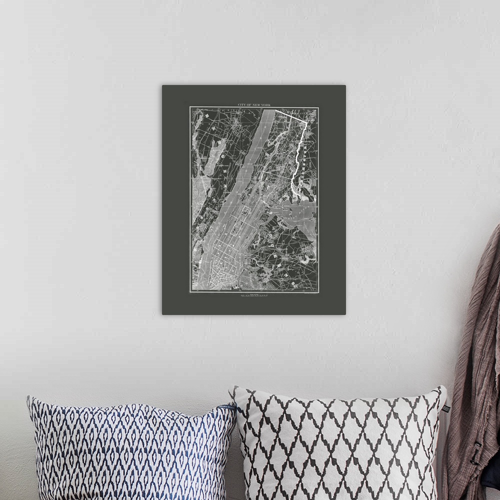 A bohemian room featuring Black and white blueprint style map of New York City with a scale at the bottom.