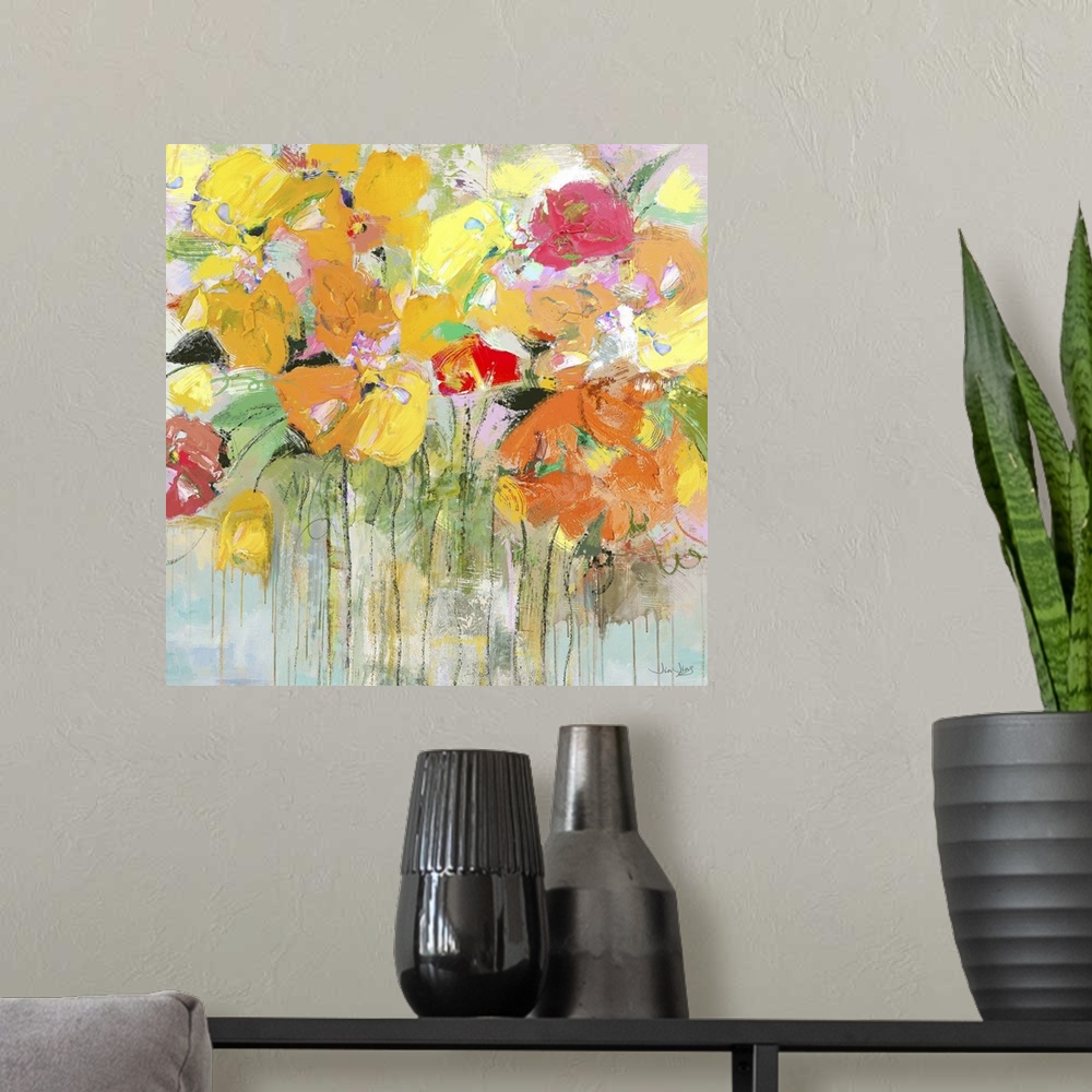 A modern room featuring Contemporary artwork of several orange, yellow, and red flowers in a garden.