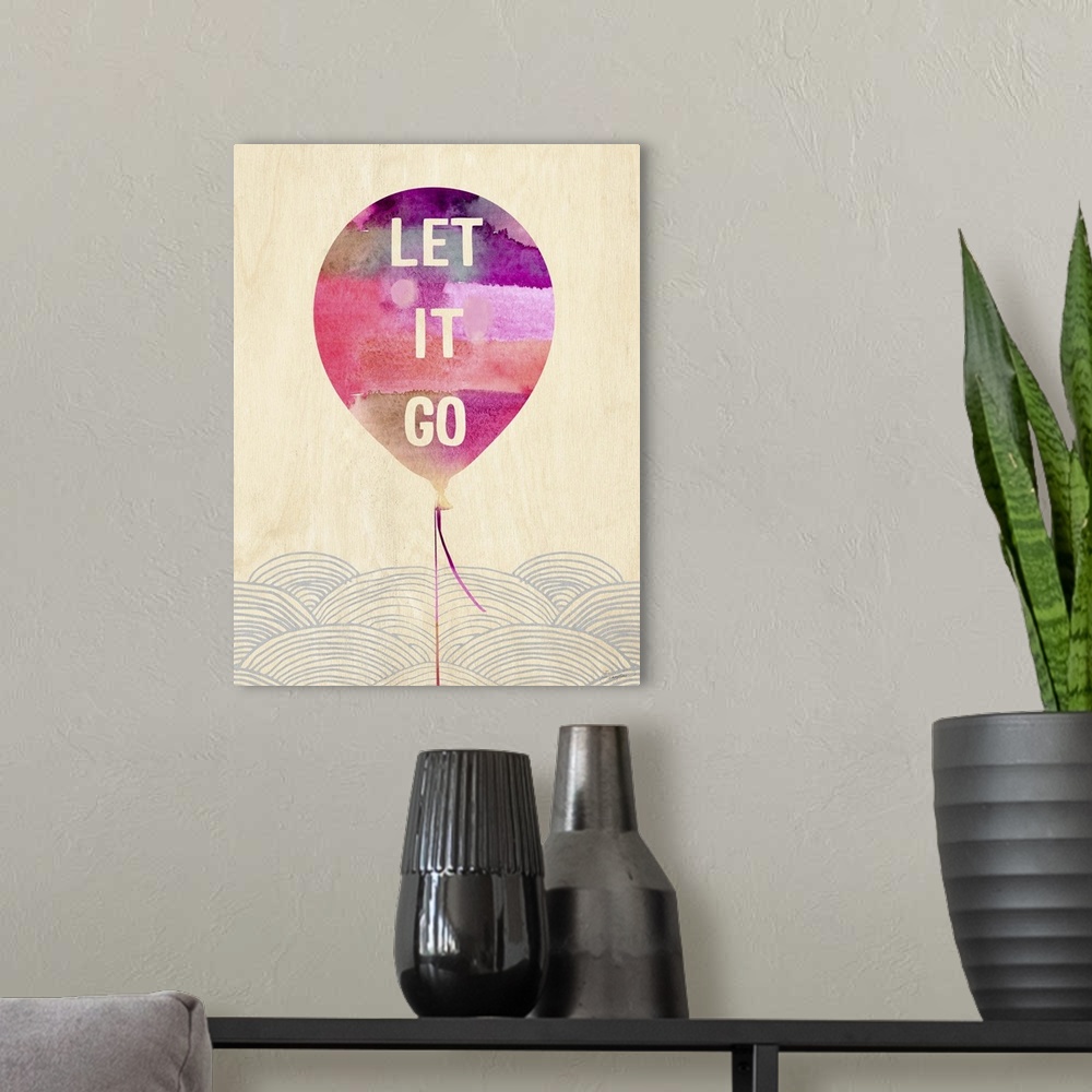 A modern room featuring Contemporary watercolor painting of a pink balloon with text in it.