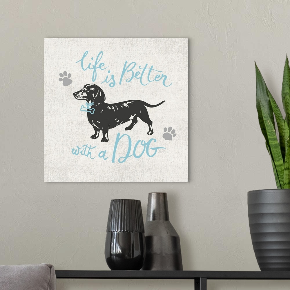 A modern room featuring Illustration of a dachshund wearing a bone collar with the text "Life is better with a dog."