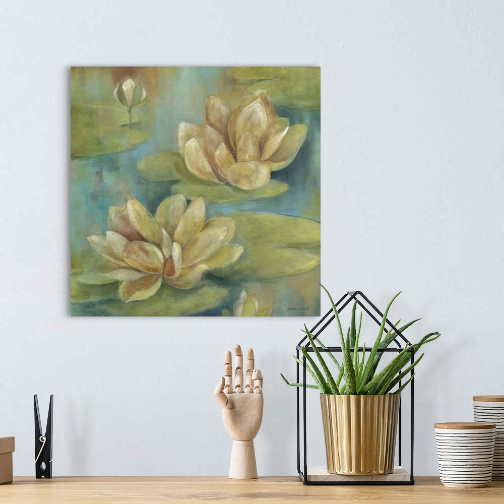 A bohemian room featuring Square painting of two water lily flowers floating in the water.