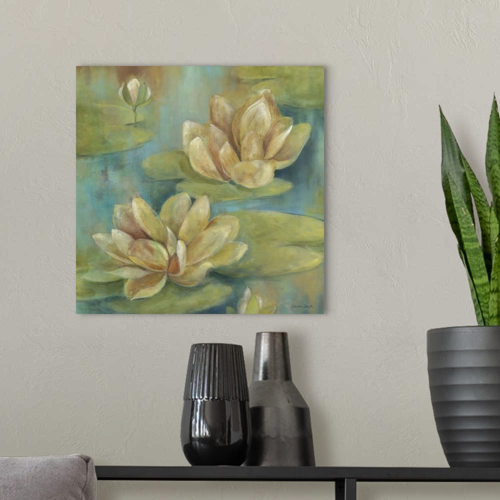 A modern room featuring Square painting of two water lily flowers floating in the water.