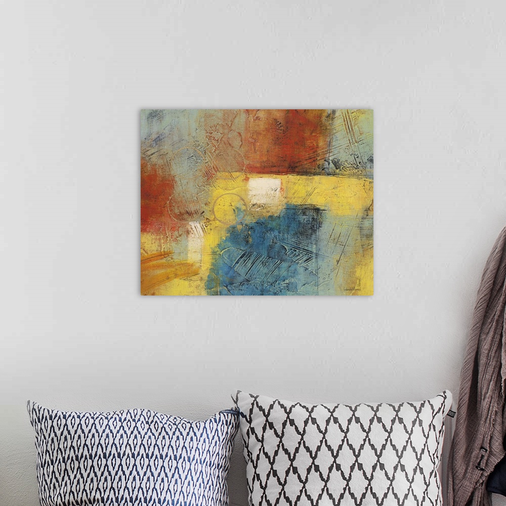 A bohemian room featuring Contemporary abstract artwork using warm and cool tones thrown together in a mix of color.