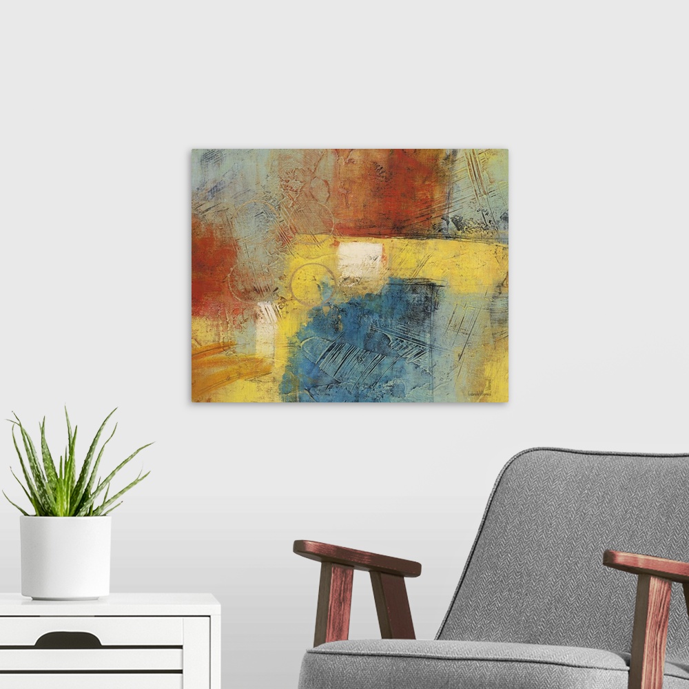 A modern room featuring Contemporary abstract artwork using warm and cool tones thrown together in a mix of color.