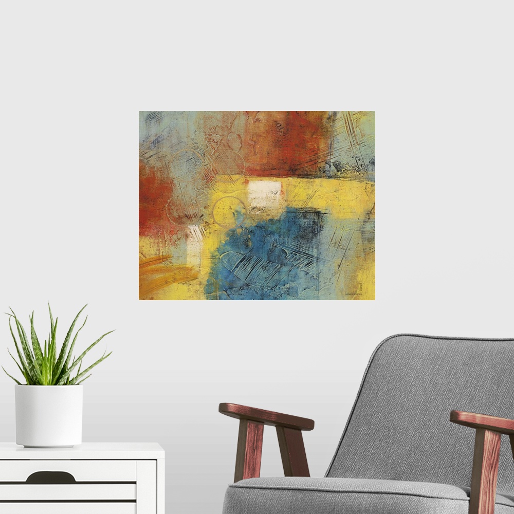 A modern room featuring Contemporary abstract artwork using warm and cool tones thrown together in a mix of color.