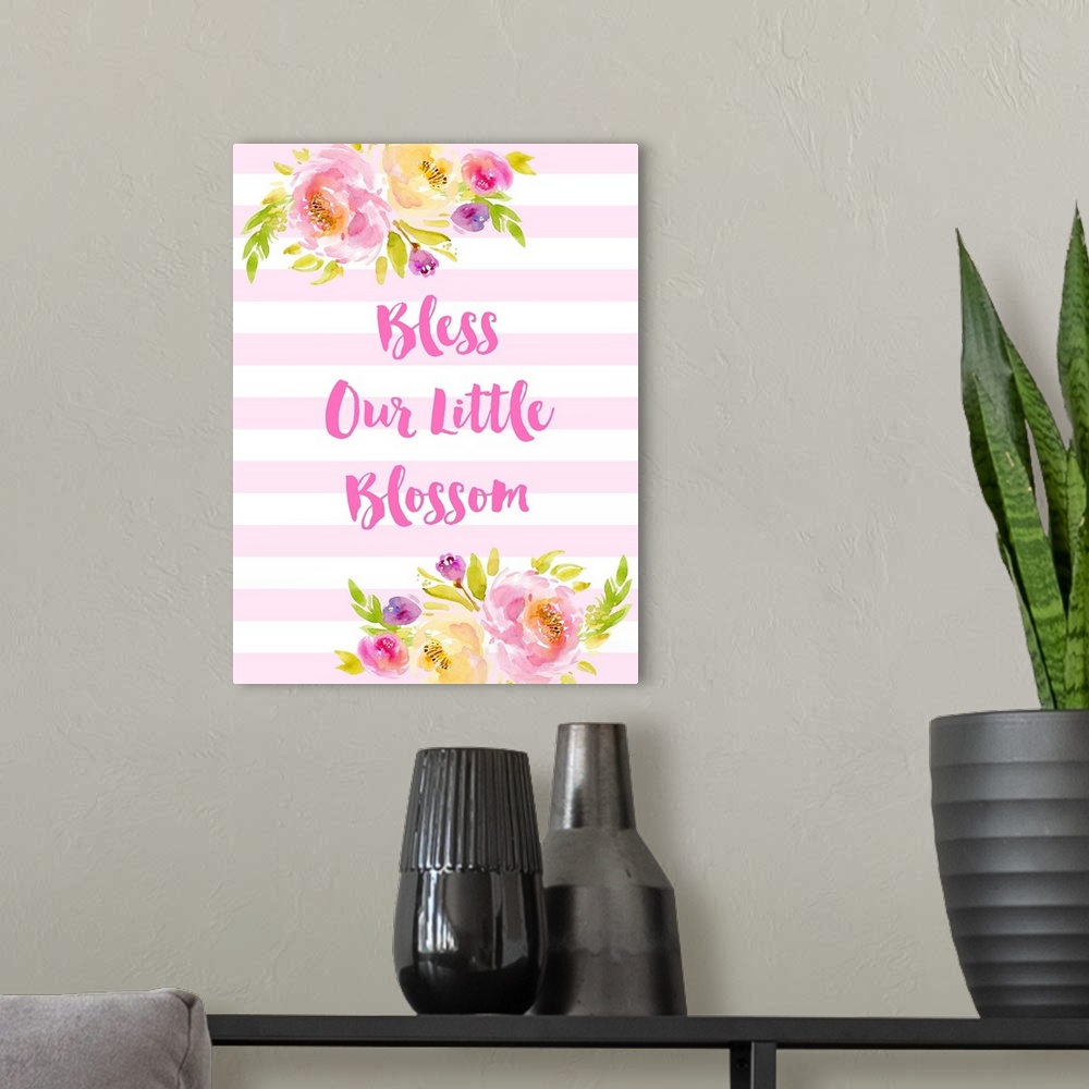A modern room featuring "God Bless Our Little Blossom" in pink and white with illustrated flowers.