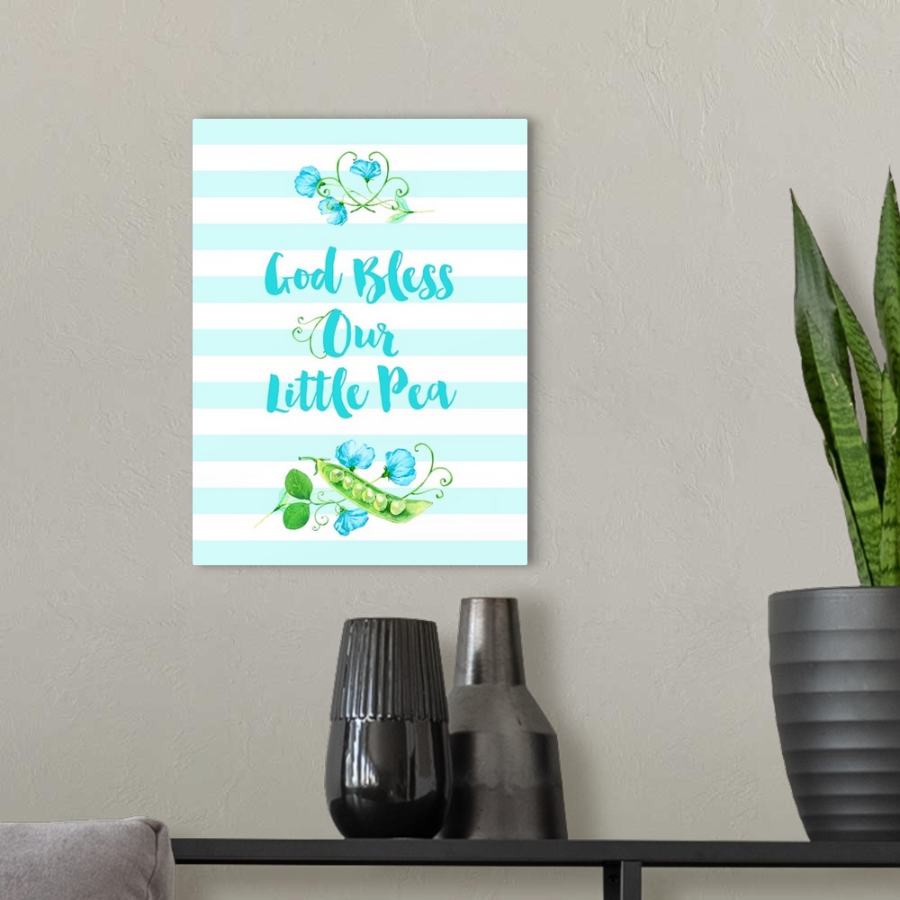 A modern room featuring "God Bless Our Little Pea" in blue, white, and green