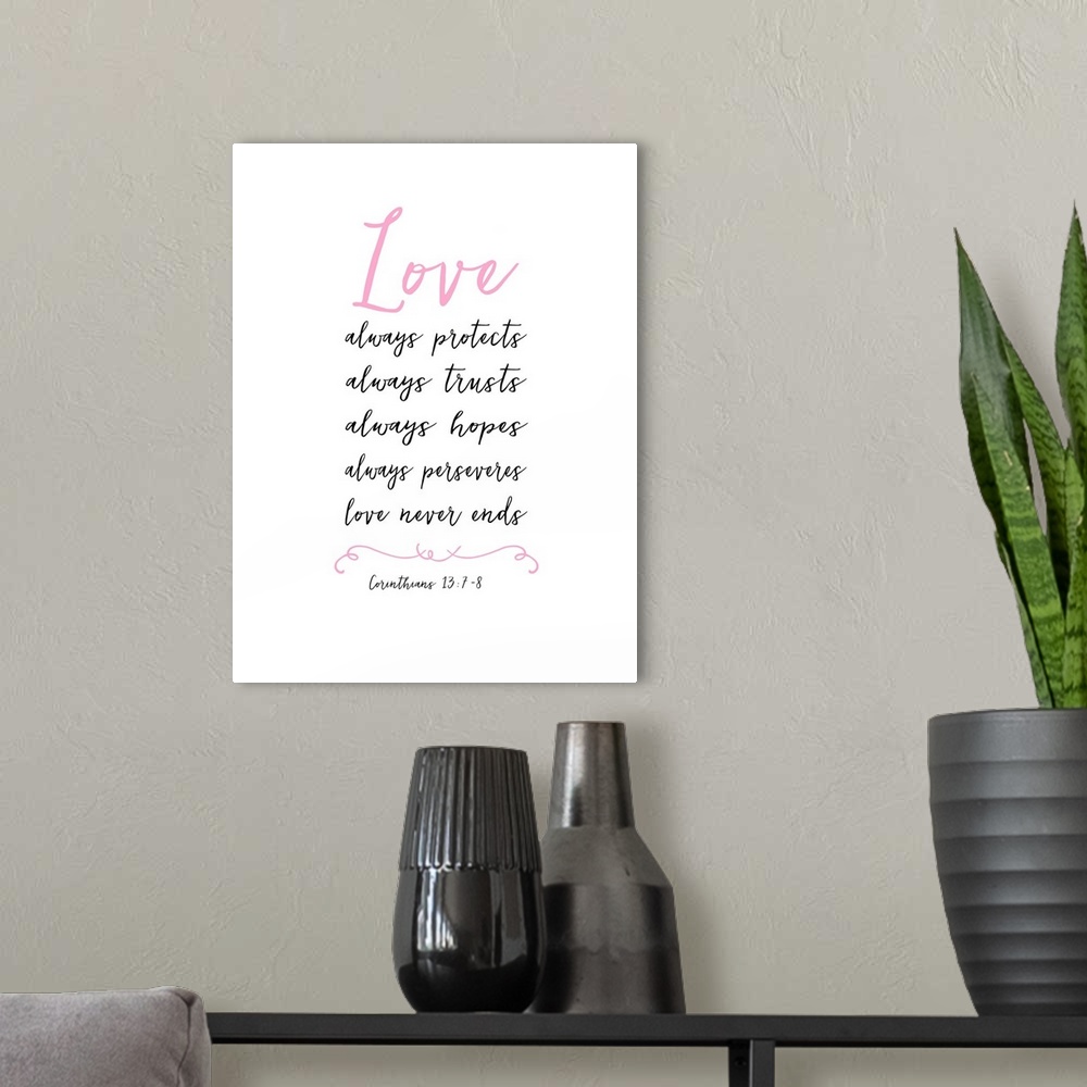 A modern room featuring "Love Always Protects, Always Trusts, Always Hopes, Always Preserves, Love Never Ends" 1 Corinthi...
