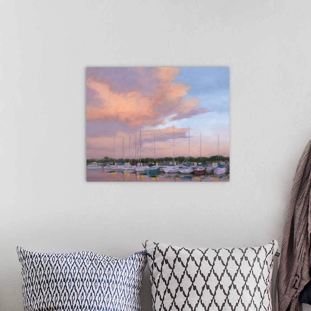 A bohemian room featuring Contemporary painting of boats in a harbor in low light at sunset.
