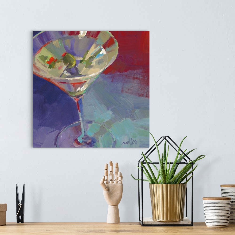 A bohemian room featuring Contemporary painting of a cocktail against a dark blue background.