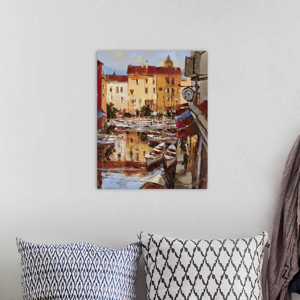 A bohemian room featuring Contemporary painting a coastal village harbor reflecting the colorful buildings that surround it.