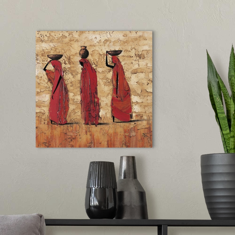 A modern room featuring Contemporary painting of tribal figures carrying food and water on their heads.