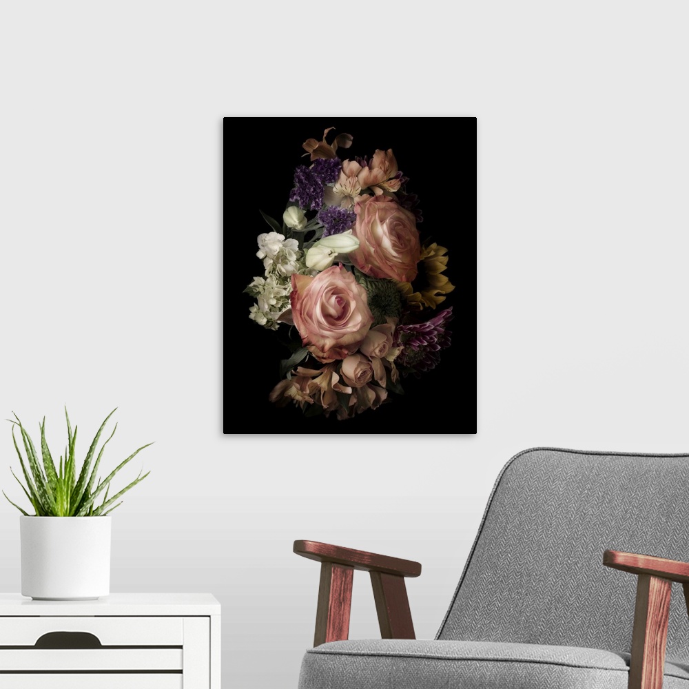 A modern room featuring Bouquet of roses and assorted flowers on black, in low light, creating a vintage feel.