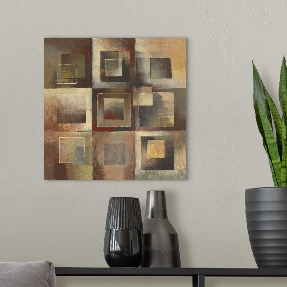 A modern room featuring Abstract painting using geometric and organic shapes in earth tones.