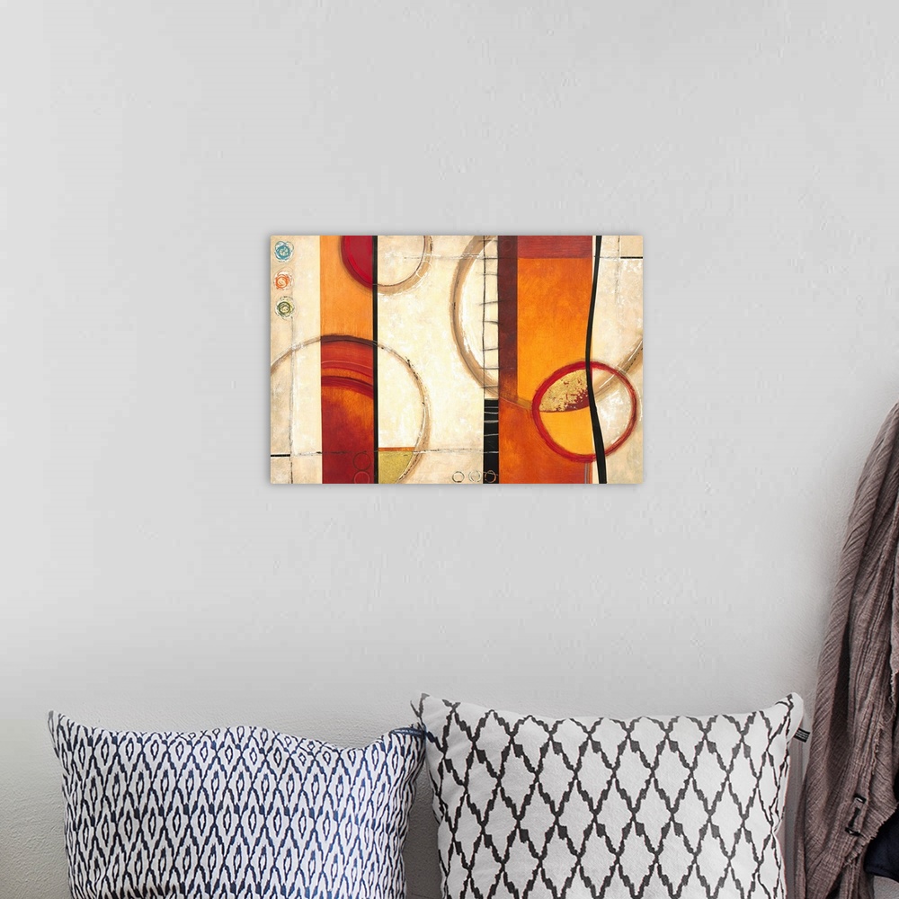A bohemian room featuring Contemporary abstract home decor artwork using warm earthy tones and geometric shapes.