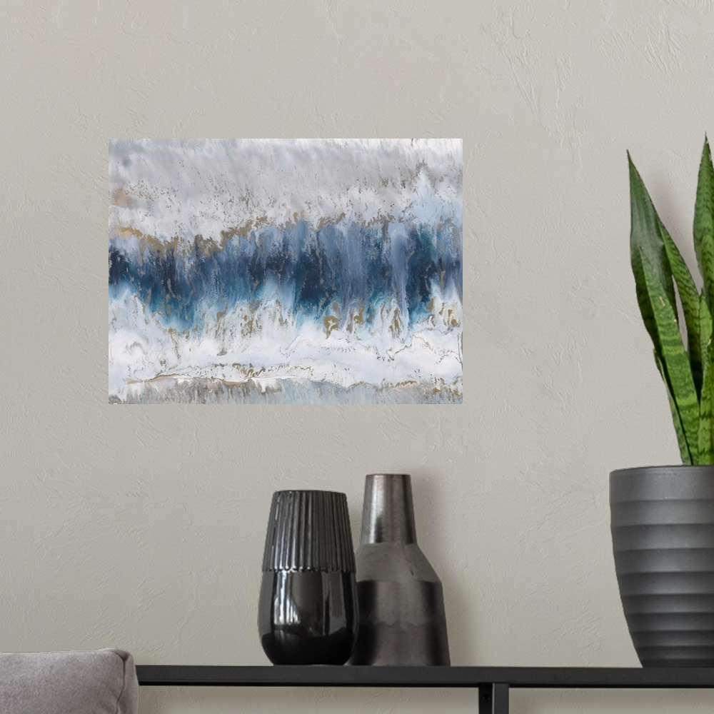 A modern room featuring Contemporary abstract painting using blue and gray tones resembling agate.