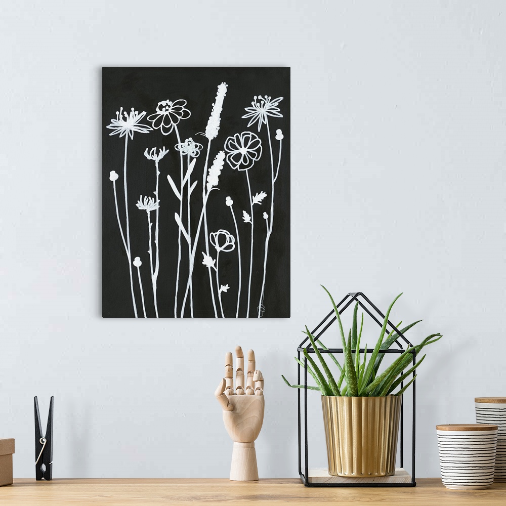 A bohemian room featuring Simple black and white illustration of long-stemmed flowers.