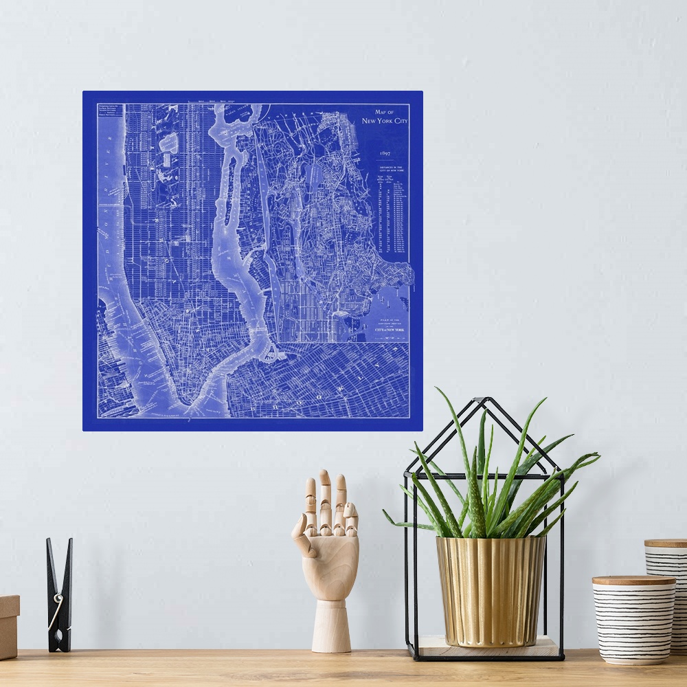 A bohemian room featuring Vintage blueprint style map of New York City.