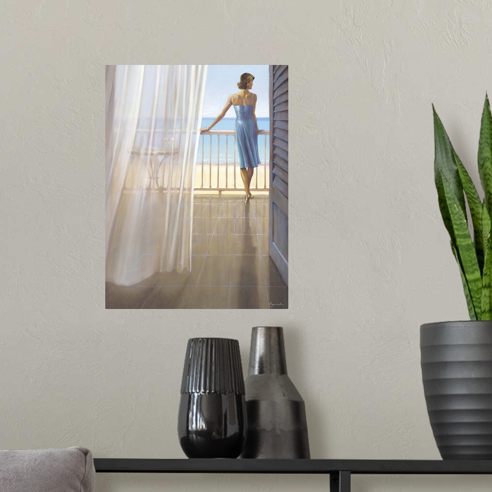 A modern room featuring Contemporary painting of woman in a blue dress standing on a balcony overlooking a beach.