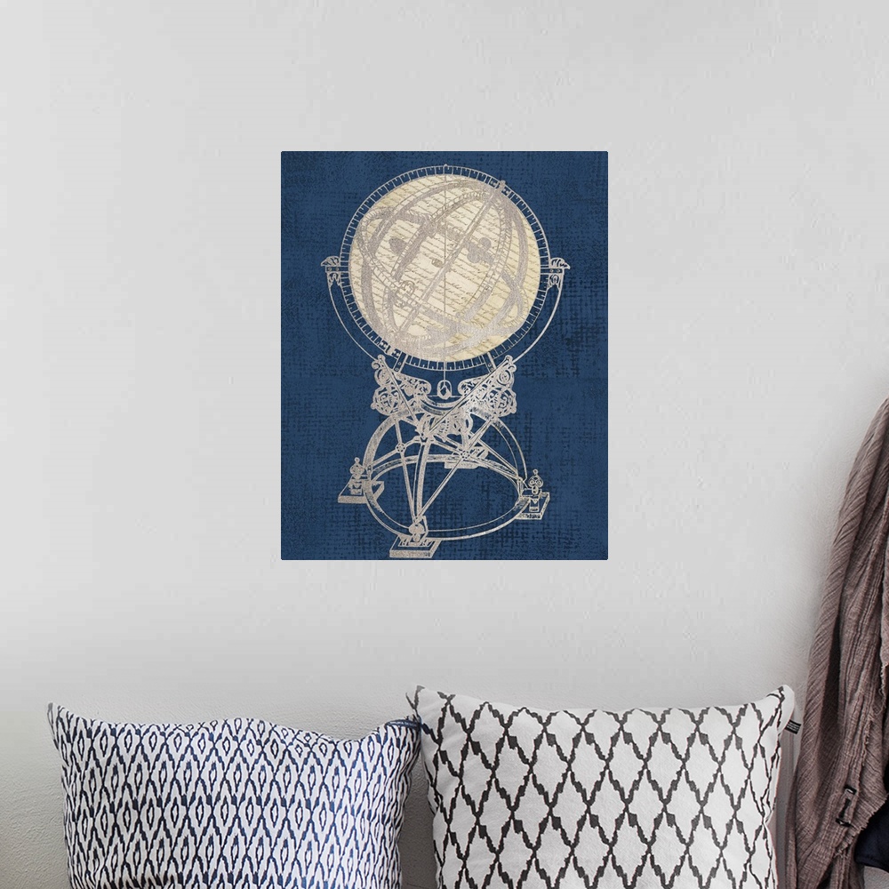 A bohemian room featuring Artwork of an antique old world globe, against a blue background.