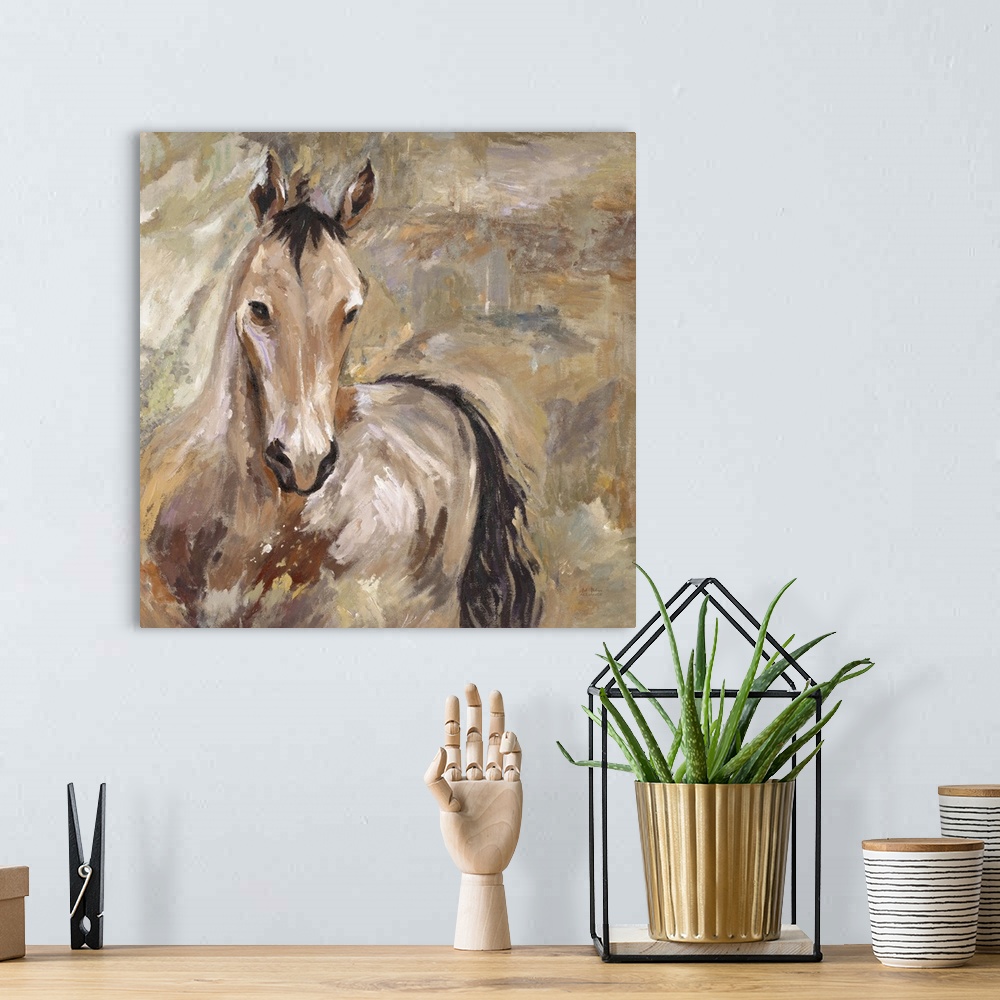 A bohemian room featuring Home decor artwork of a lone brown horse against a brown background.