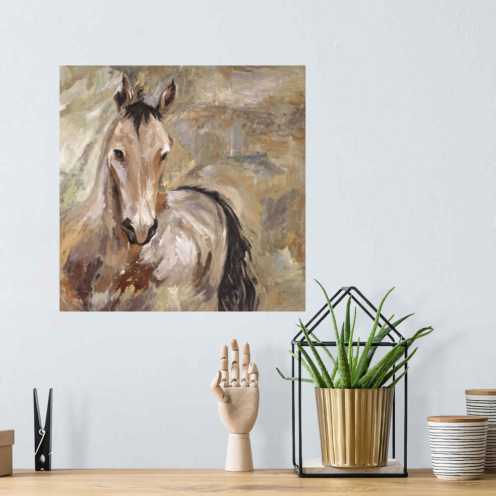 A bohemian room featuring Home decor artwork of a lone brown horse against a brown background.