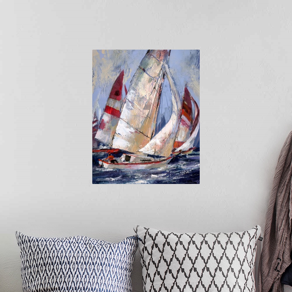 A bohemian room featuring Contemporary painting of sailboats with red white sails in a choppy ocean.