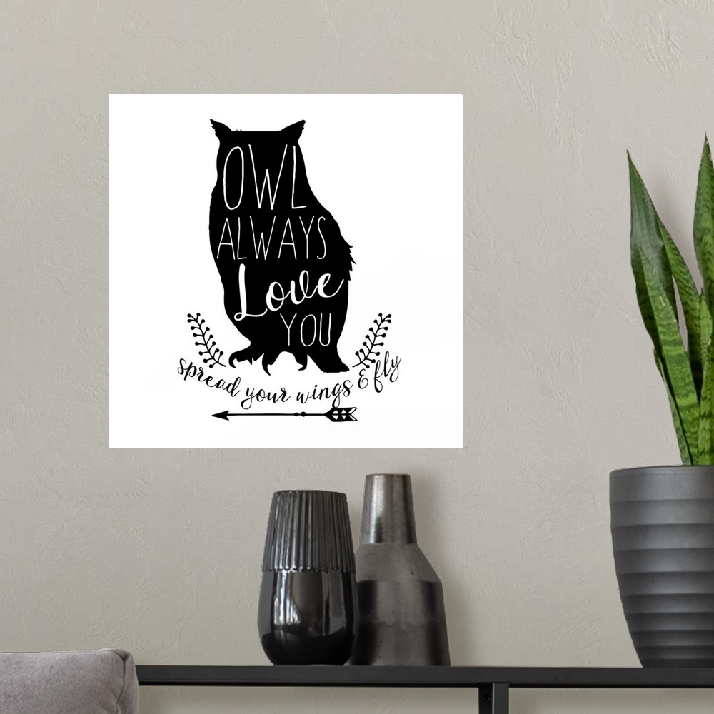 A modern room featuring Playful typography on a silhouette of an owl reading "Owl Always Love You" and "Spread Your Wings...