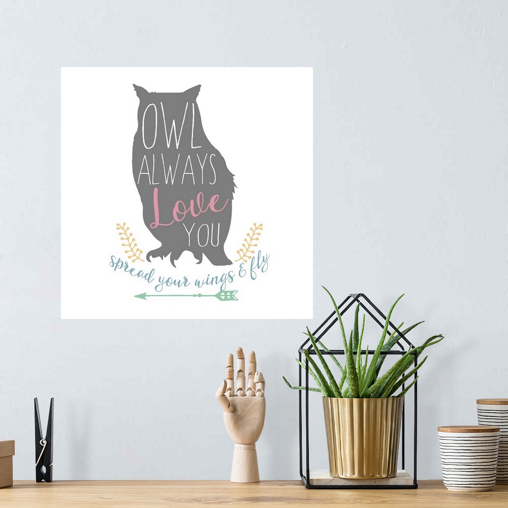 A bohemian room featuring Playful typography on a silhouette of an owl reading "Owl Always Love You" and "Spread Your Wings...