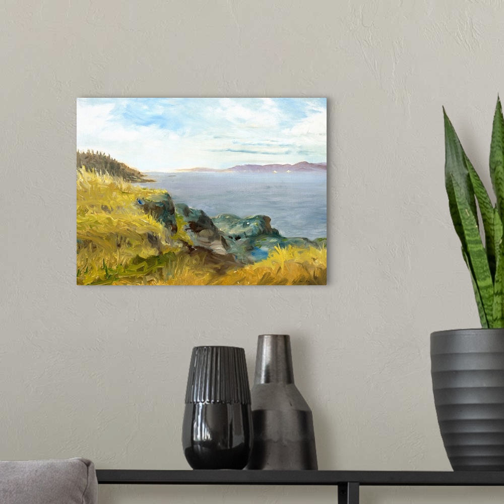 A modern room featuring Contemporary artwork of a rocky cliff overlooking the ocean.