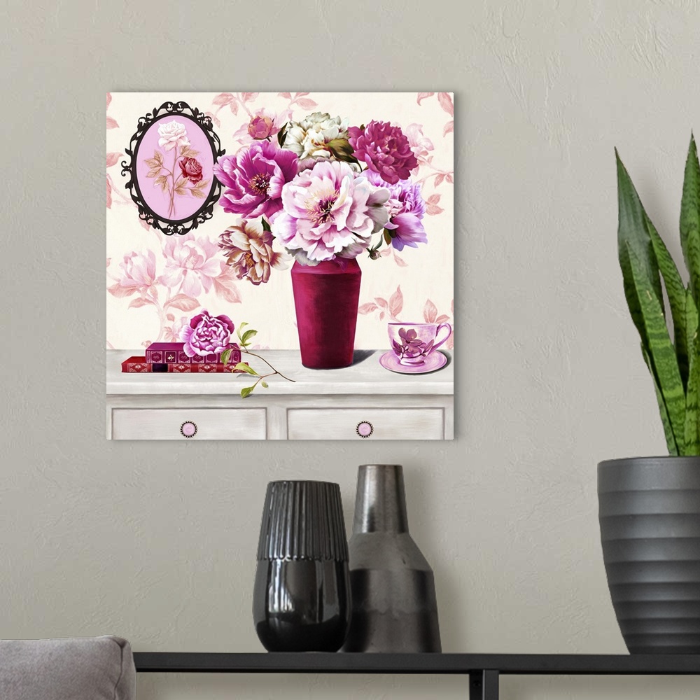 A modern room featuring Contemporary vibrant home decor artwork of a floral still-life in bright pink tones.