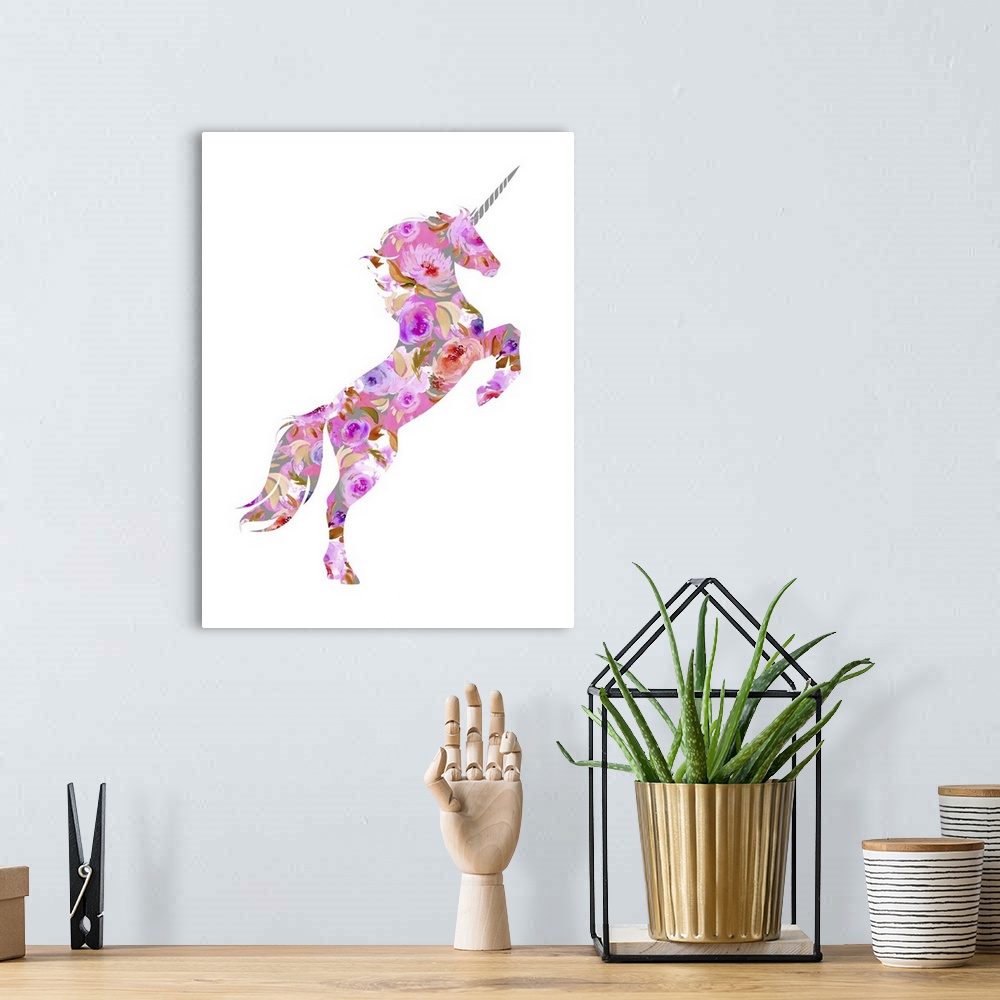A bohemian room featuring Illustration of a pink, purple, red, and gray floral unicorn on a white background.