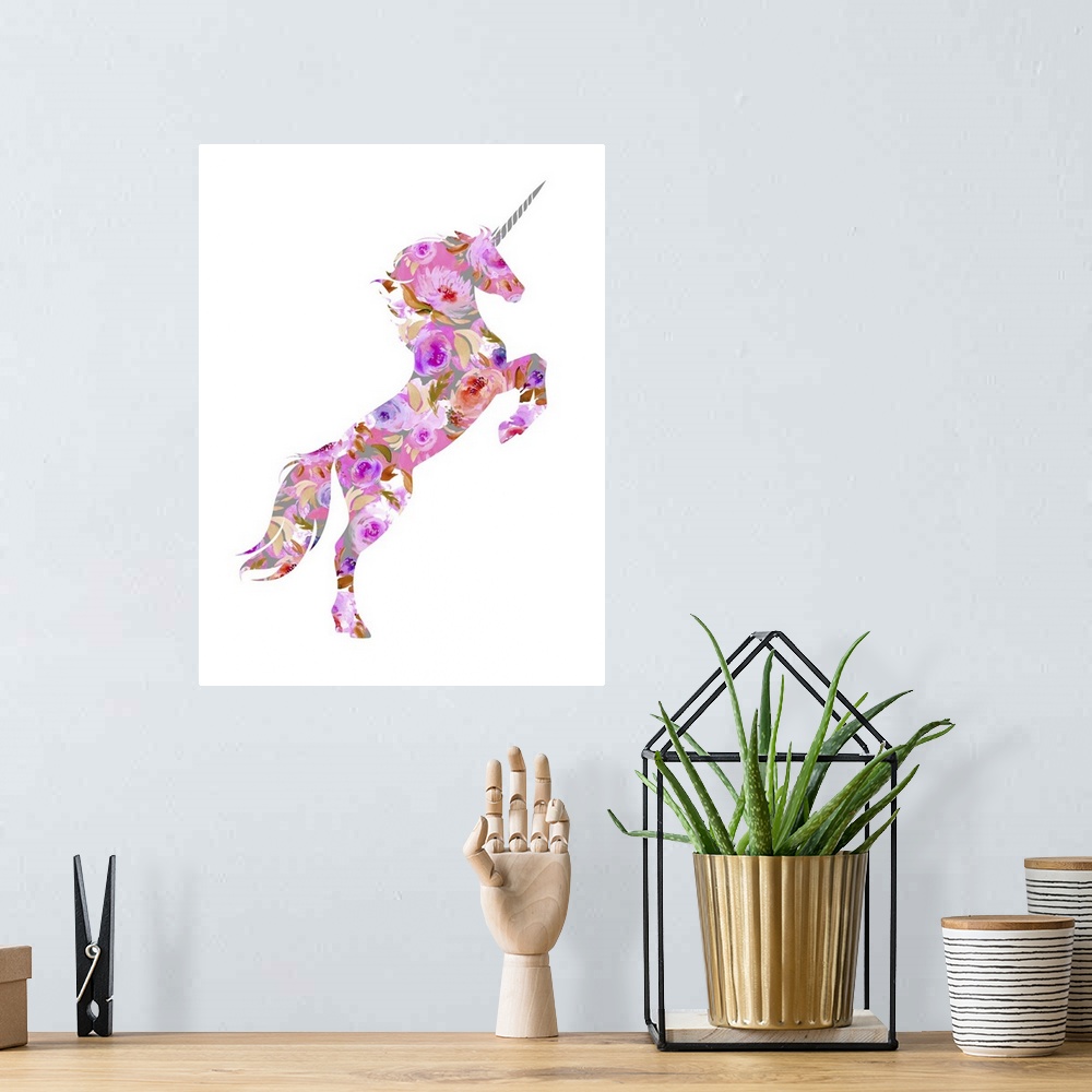 A bohemian room featuring Illustration of a pink, purple, red, and gray floral unicorn on a white background.