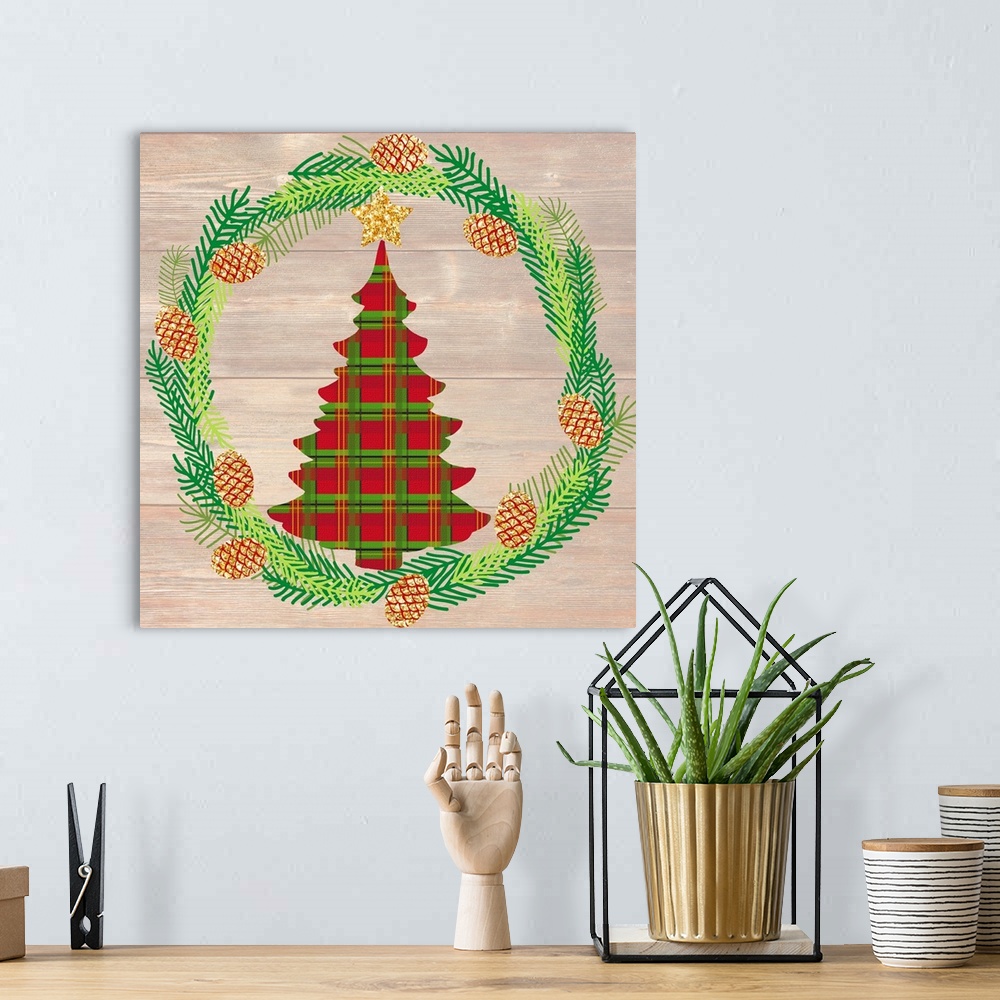 A bohemian room featuring Plaid silhouette of a Christmas tree inside of a Winter wreath in blue, green, and gold hues on a...