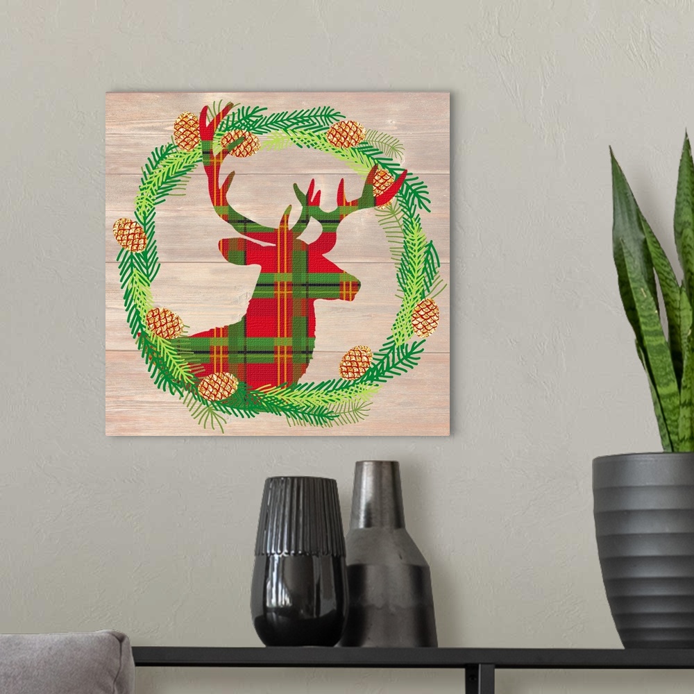A modern room featuring Plaid silhouette of a deer inside of a Winter wreath in blue, green, and gold hues on a faux wood...