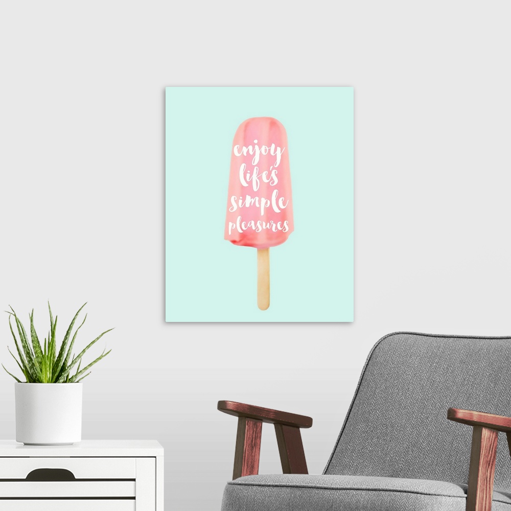 A modern room featuring "Enjoy Life's Simple Pleasures" written inside of a pink popsicle on a pale blue background.