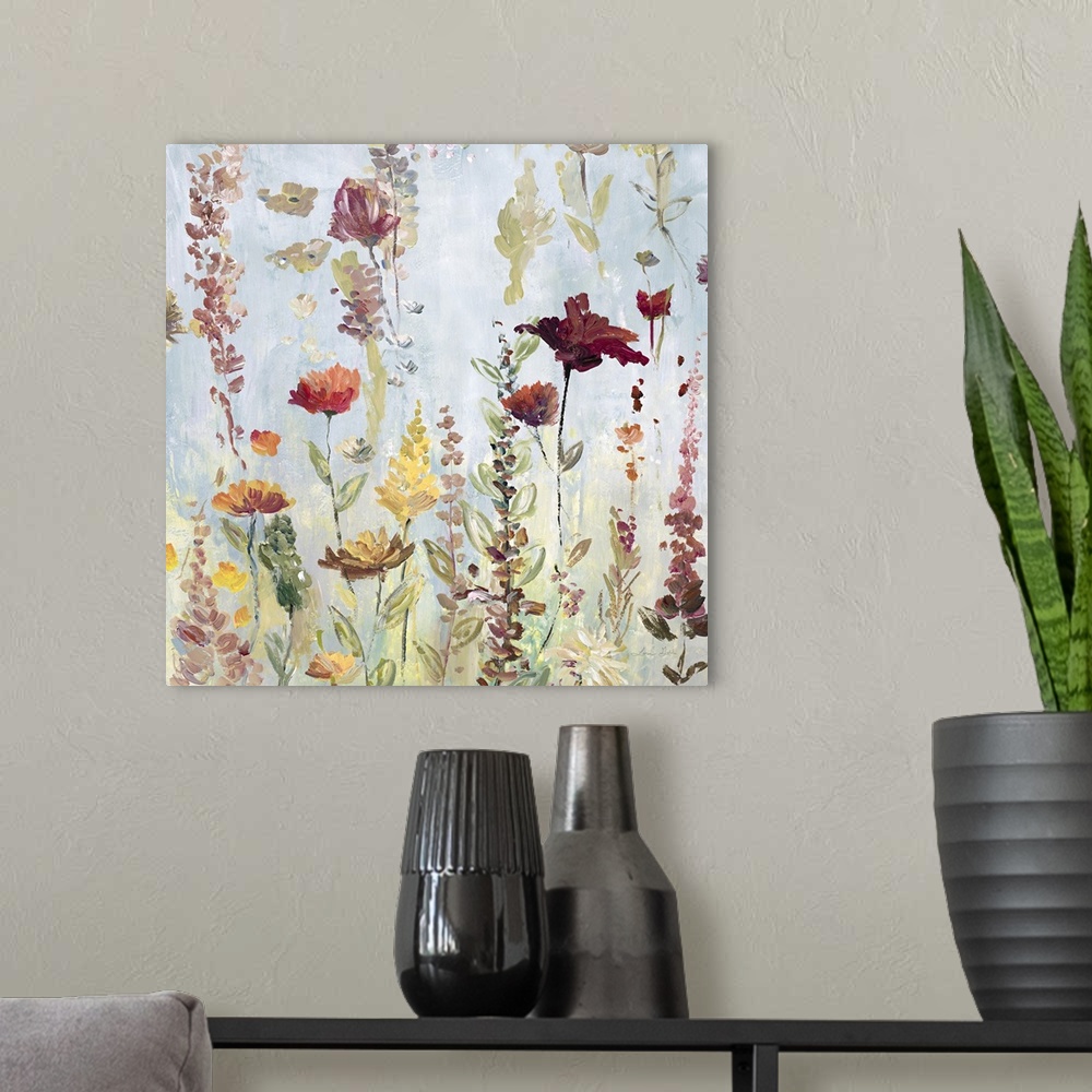 A modern room featuring Watercolor artwork of a garden full of tall, blooming flowers in shades of pink and yellow.